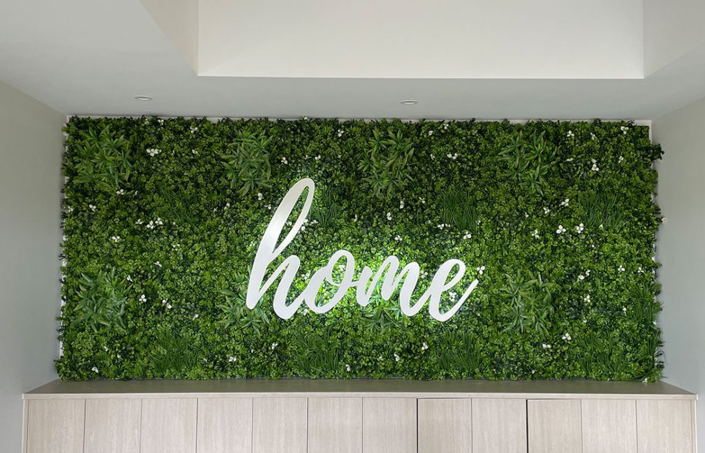 project-Dennis-Family-Homes--Plant-Wall-With-Halo-Illuminated-Lettering